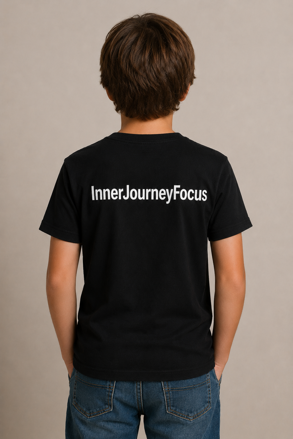 Child wearing black InnerJourneyFocus shirt, back view