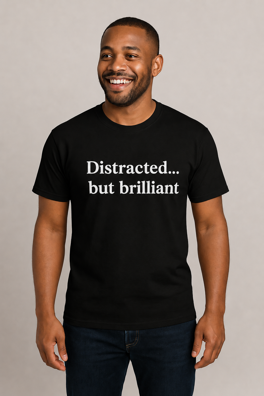 Man wearing black Distracted But Brilliant shirt, front view